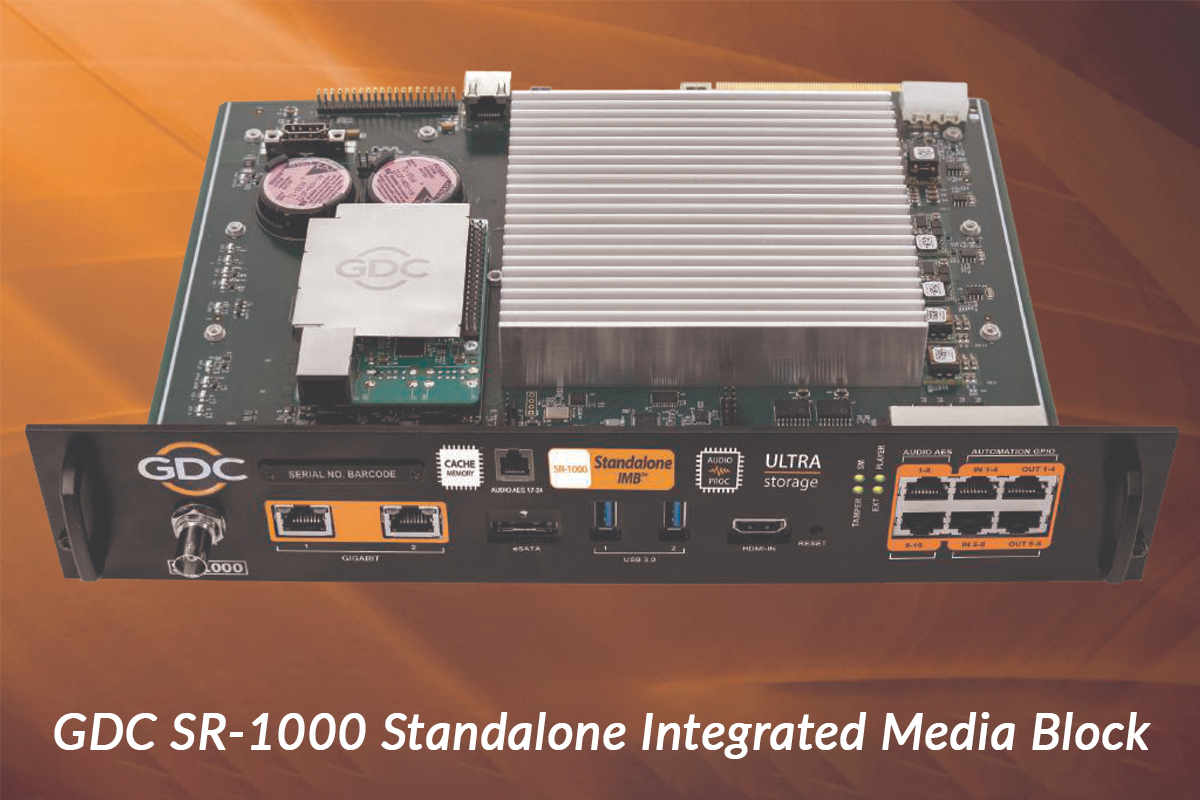 Looking inside a GDC SR-1000 Standalone Integrated Media Block (cinema server) on an orange background.