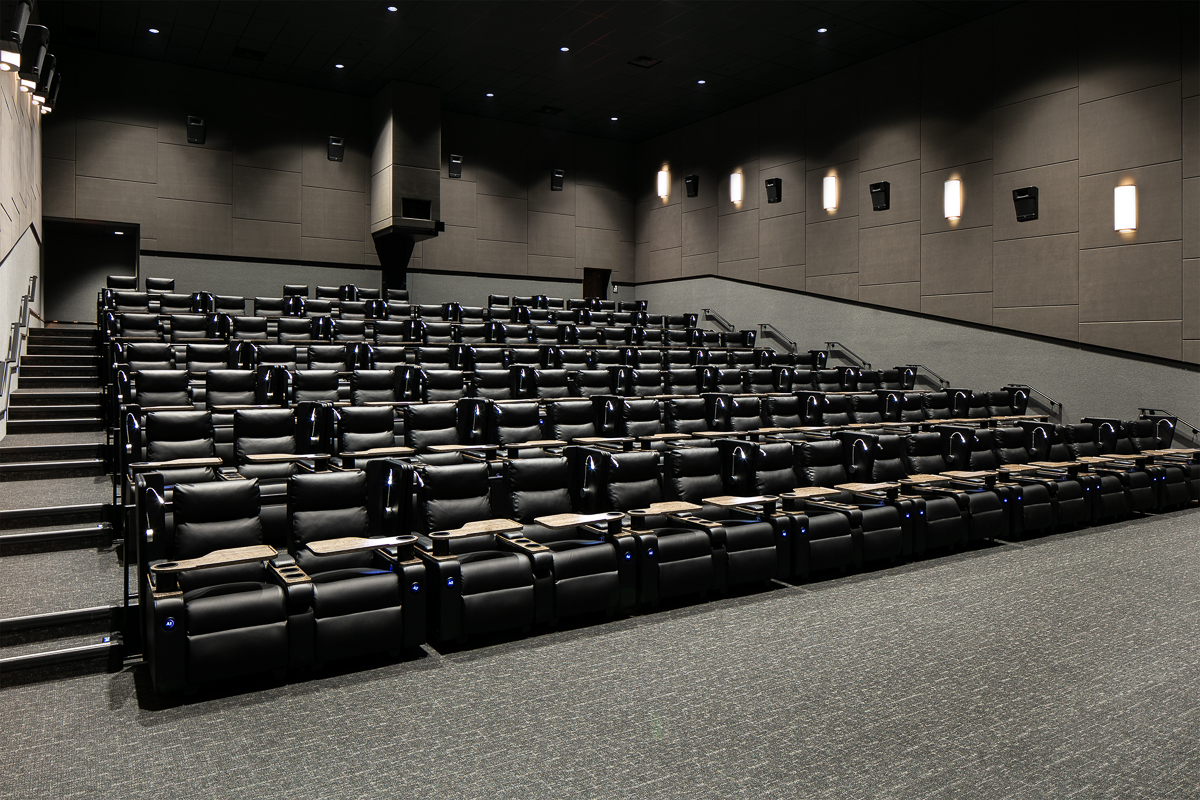 A wide view of leather cinema recliners designed and installed by Entertainment Supply & Technologies.
