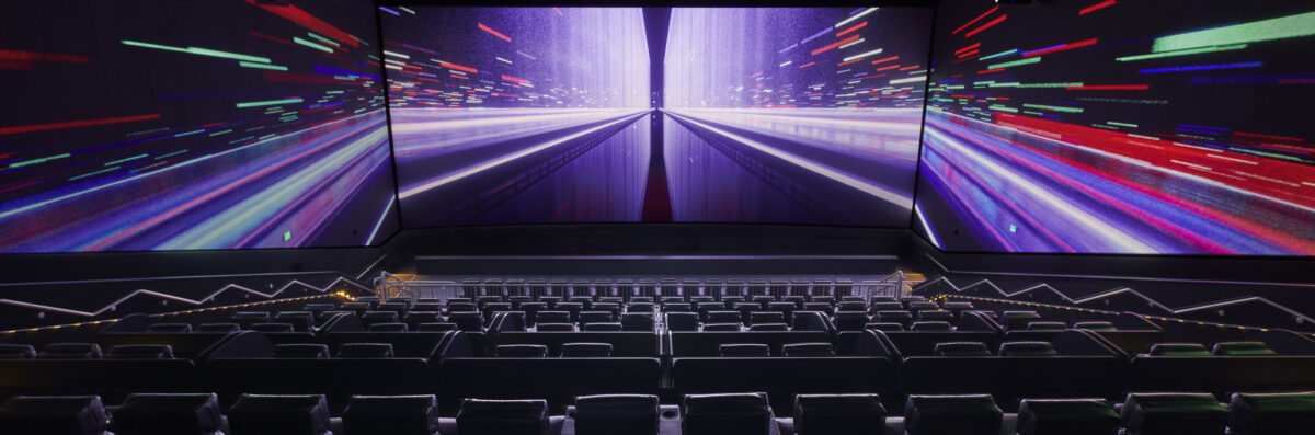 MJR Marketplace ScreenX auditorium view of the screen with laser image projected.