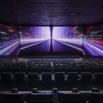 MJR Marketplace ScreenX auditorium view of the screen with laser image projected.