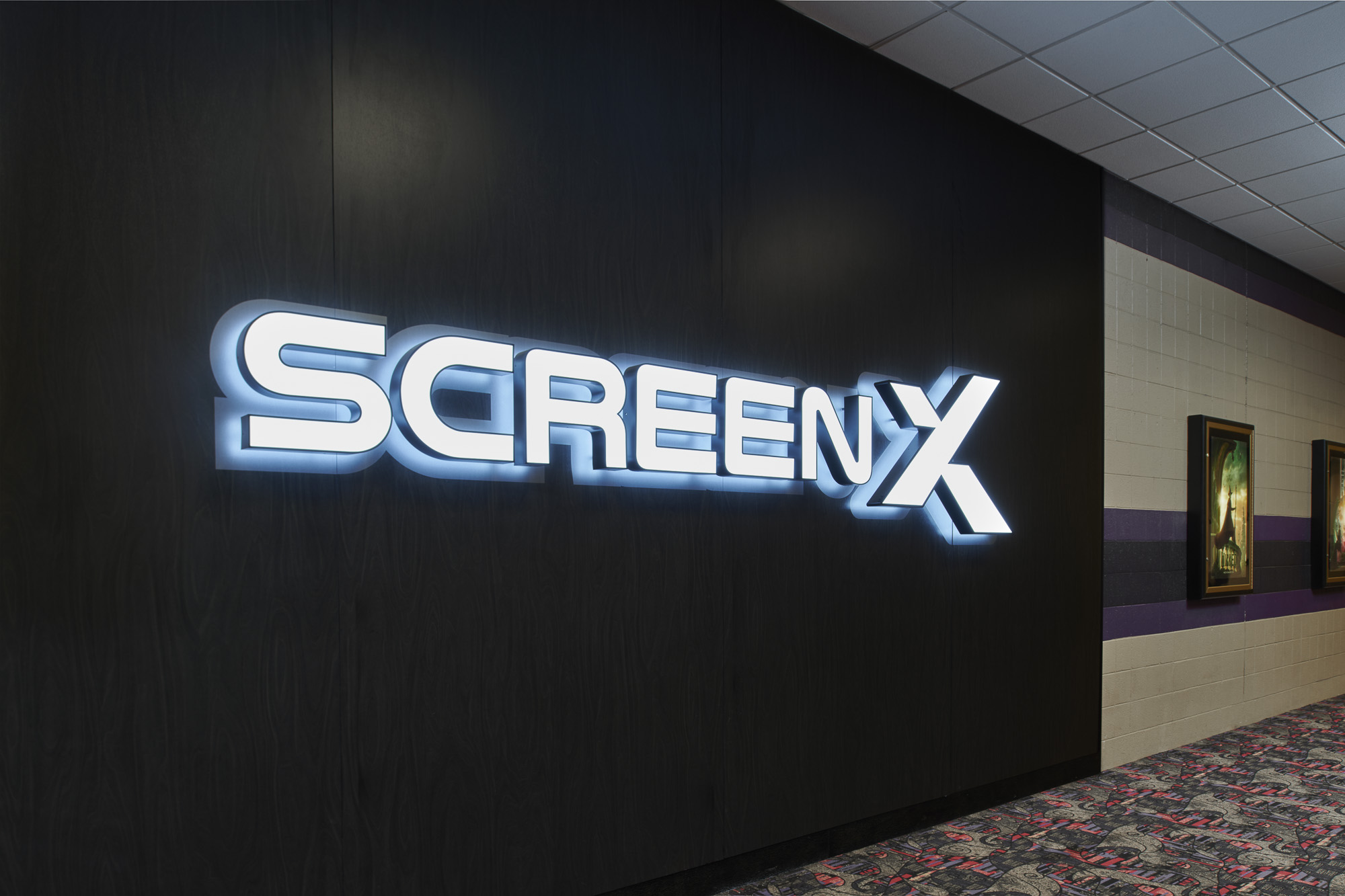 MJR Marketplace ScreenX auditorium entry portal signage.